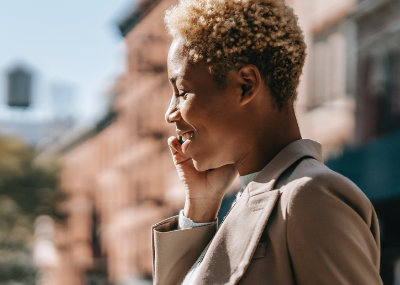 A photo of a lady using her smartphone